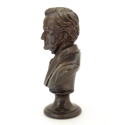 827 - A 19thC cast bronze bust of the German composer Wilhelm Richard Wagner. Approx. 9