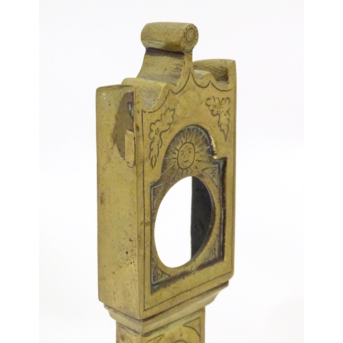 829 - A late 19th / early 20thC brass pocket watch holder modelled as a miniature long case clock with nai... 