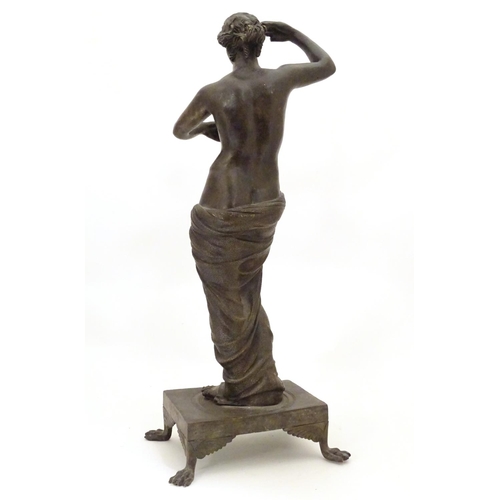 830 - A late 19th / early 20thC cast bronze sculpture modelled as a classical woman, possibly Venus / Aphr... 