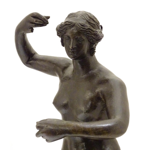 830 - A late 19th / early 20thC cast bronze sculpture modelled as a classical woman, possibly Venus / Aphr... 