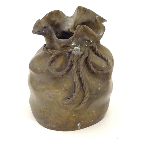 831 - A late 19thC cast bronze modelled as a sack with a rope tie. Marked under. Approx. 6 3/4