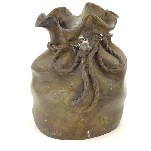 831 - A late 19thC cast bronze modelled as a sack with a rope tie. Marked under. Approx. 6 3/4