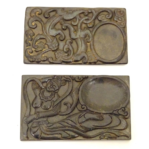 843 - Two Chinese carved stone ink stones, one depicting a dancing figure, the other depicting stylised dr... 