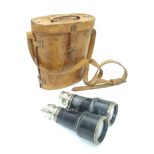 932 - A pair of Binoculars / Field Glasses by Chevalier, Paris, with sunshades and associated leather case