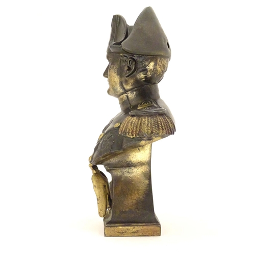 946 - A 20thC cast bust of emperor Napoleon Bonaparte wearing uniform and a bicorne hat, with gilt highlig... 