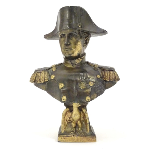 946 - A 20thC cast bust of emperor Napoleon Bonaparte wearing uniform and a bicorne hat, with gilt highlig... 