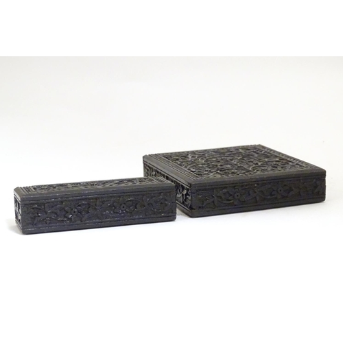 952 - A Victorian ebonised card case with floral and foliate carved detail. Approx. 4 1/4