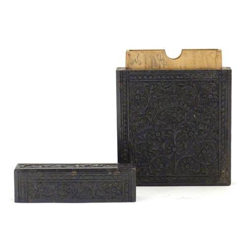 952 - A Victorian ebonised card case with floral and foliate carved detail. Approx. 4 1/4