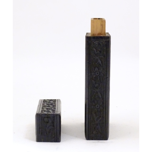 952 - A Victorian ebonised card case with floral and foliate carved detail. Approx. 4 1/4