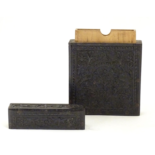 952 - A Victorian ebonised card case with floral and foliate carved detail. Approx. 4 1/4