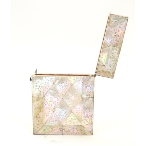 955 - A Victorian mother of pearl card case of rectangular form with a hinged lid and push button release.... 