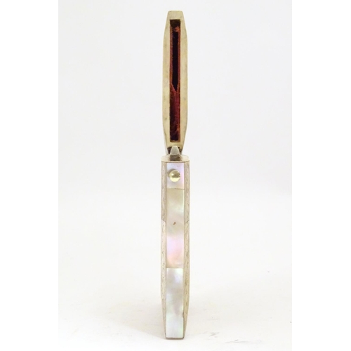 955 - A Victorian mother of pearl card case of rectangular form with a hinged lid and push button release.... 