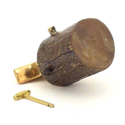 965 - An early 20thC small proportion brass model anvil mounted on a tree stump base with hammer. Approx. ... 