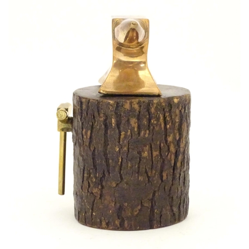 965 - An early 20thC small proportion brass model anvil mounted on a tree stump base with hammer. Approx. ... 