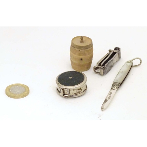 971 - Four assorted Victorian and later items to include a treen thread box of barrel form, a silver foldi... 