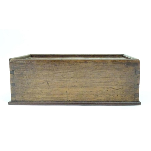 976 - A Georgian spice box, the sliding lid opening to reveal four sections within. The lid decorated with... 