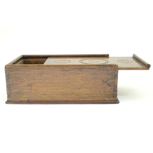 976 - A Georgian spice box, the sliding lid opening to reveal four sections within. The lid decorated with... 