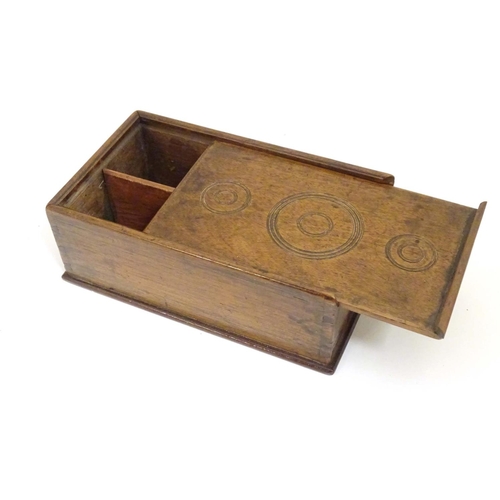 976 - A Georgian spice box, the sliding lid opening to reveal four sections within. The lid decorated with... 