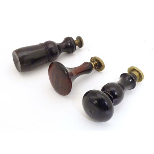 978 - Three late 19th / early 20thC treen desk / hand seals with turned wooden handles and brass seals und... 