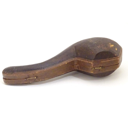 980 - An early 20thC cased carved meerschaum pipe, the bowl formed as an eagle talon, joined to the amber ... 