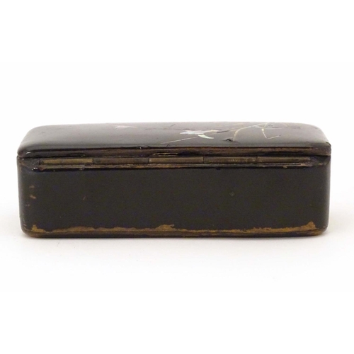 984 - A late 19th / early 20thC papier mache snuff box with inlaid mother of pearl detail depicting flight... 