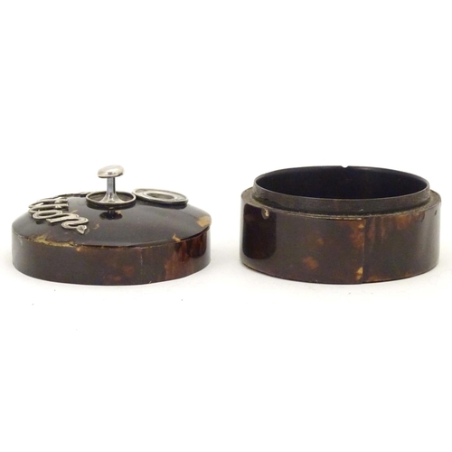 988 - A Victorian turned wooden button box with tortoiseshell veneer of circular form with silver mounts, ... 