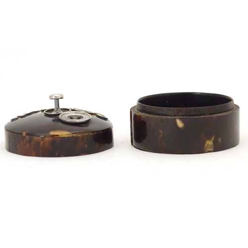 988 - A Victorian turned wooden button box with tortoiseshell veneer of circular form with silver mounts, ... 