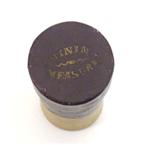 989 - A 19thC glass chemist / medicine measure contained within a case marked Minim Measure. Glass approx.... 