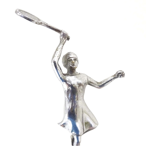 990 - A 20thC chrome car mascot modelled as a female tennis player. Approx. 7 3/4