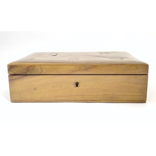 997 - A late 19th / early 20thC olivewood sewing box the hinged lid inlaid with sewing implement decoratio... 