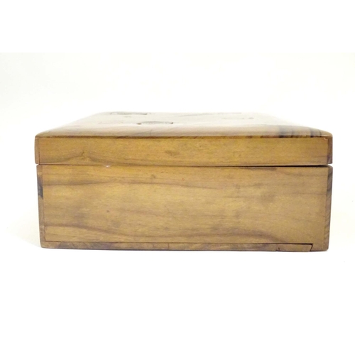 997 - A late 19th / early 20thC olivewood sewing box the hinged lid inlaid with sewing implement decoratio... 