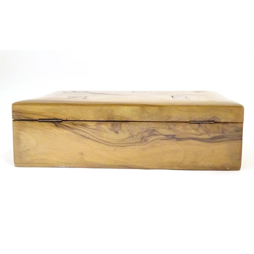 997 - A late 19th / early 20thC olivewood sewing box the hinged lid inlaid with sewing implement decoratio... 