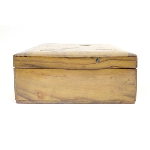 997 - A late 19th / early 20thC olivewood sewing box the hinged lid inlaid with sewing implement decoratio... 