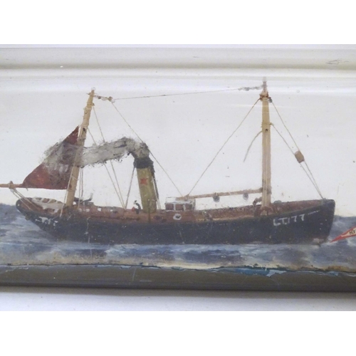 999 - A 20thC ship in a bottle / diorama depicting Kindred Star LT177, a steam trawler boat at sea. Approx... 