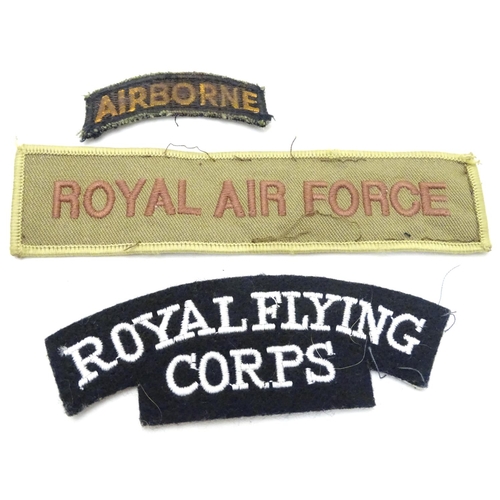 583 - Militaria: an assortment of 20thC military cloth badges, together with a 1954 Civil Defence Corps HQ... 