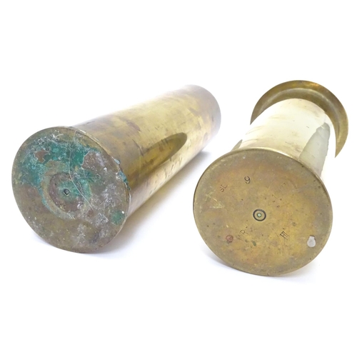 593 - Militaria : two brass artillery shell/cartridge cases, with headstamps for 1917 (German 77mm, WWI) a... 