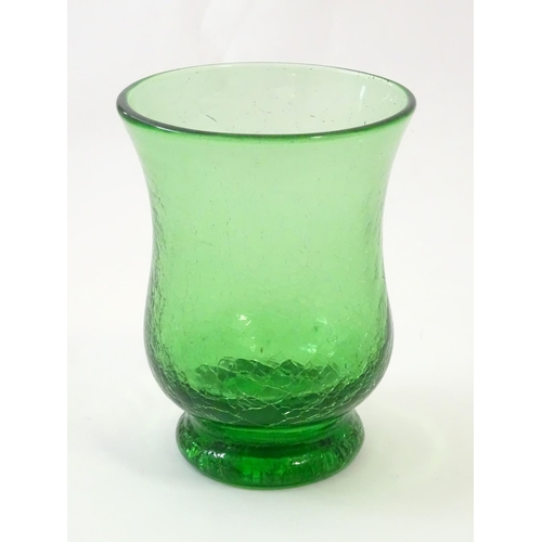 166 - A green glass vase with crackle detail. Approx. 6” high.