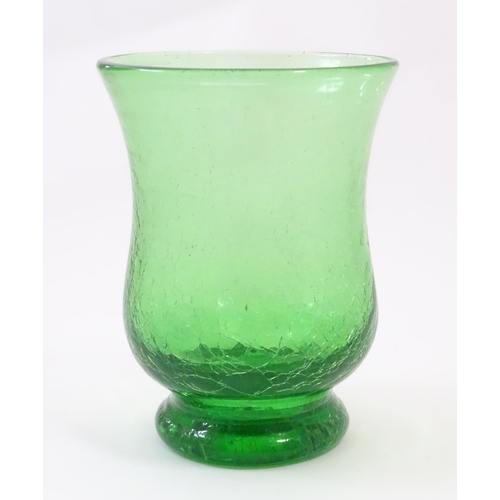 166 - A green glass vase with crackle detail. Approx. 6” high.