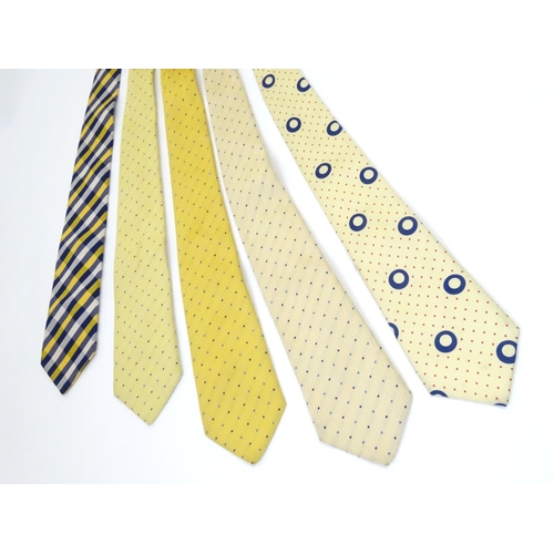 753 - 5 Turnbull & Asser London silk ties in yellow and navy designs. (5)