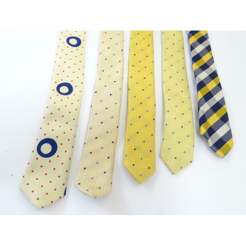 753 - 5 Turnbull & Asser London silk ties in yellow and navy designs. (5)