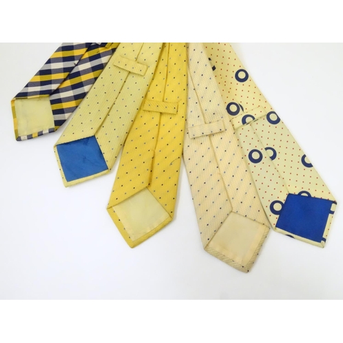 753 - 5 Turnbull & Asser London silk ties in yellow and navy designs. (5)