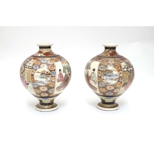 19 - A pair of Japanese Satsuma vases of globular form in the Kutani style with flared rims and feet. The... 