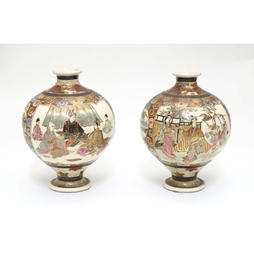 19 - A pair of Japanese Satsuma vases of globular form in the Kutani style with flared rims and feet. The... 