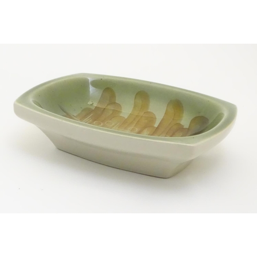 141 - A Ditmar Urbach slipware bowl with hand painted green and brown abstract detail. Marked under and im... 