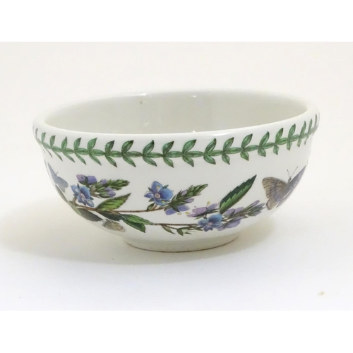 185 - Five items of Portmeirion wares comprising a large bowl, an oval serving plate, two dishes and a cer... 