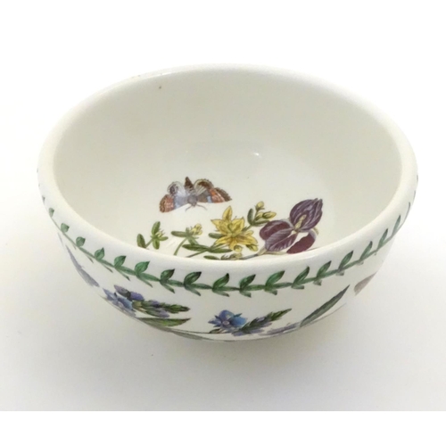 185 - Five items of Portmeirion wares comprising a large bowl, an oval serving plate, two dishes and a cer... 