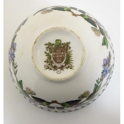 185 - Five items of Portmeirion wares comprising a large bowl, an oval serving plate, two dishes and a cer... 