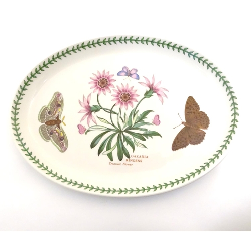 185 - Five items of Portmeirion wares comprising a large bowl, an oval serving plate, two dishes and a cer... 