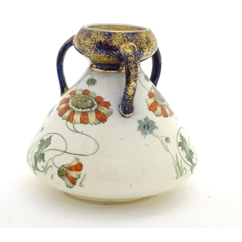 111 - An Art Nouveau tyg vase with a bulbous body decorated with tendril floral and foliate detail. Approx... 