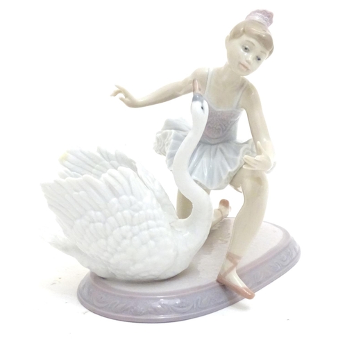 126 - A Lladro ballet dancer and a swan on an oval base, Graceful Dance, model no. 6205. Marked under. App... 